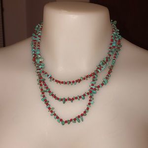 Green and red necklace with earrings and bracelet